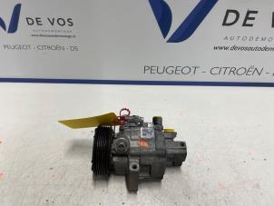 Usados Bomba de aire acondicionado Peugeot 107 1.0 12V Precio € 160,00 Norma de margen ofrecido por De Vos Autodemontagebedrijf