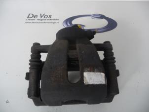 Used Front brake calliper, left Citroen C2 (JM) 1.1 Price € 45,00 Margin scheme offered by De Vos Autodemontagebedrijf