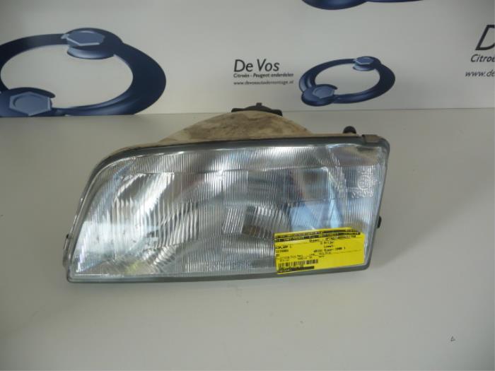 Headlight, left from a Citroën ZX Break 1.9D 1998