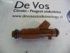 Injector (petrol injection) from a Peugeot 306 2000