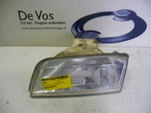 Used Headlight, left Citroen ZX 1.4i Aura,Avantage,Familiale,Reflex Price € 35,00 Margin scheme offered by De Vos Autodemontagebedrijf
