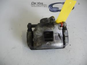 Used Front brake calliper, left Citroen C4 Cactus (0B/0P) 1.2 PureTech 82 12V Price € 70,00 Margin scheme offered by De Vos Autodemontagebedrijf