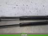Set of tailgate gas struts from a Volkswagen Up! (121) 1.0 12V 60 2013
