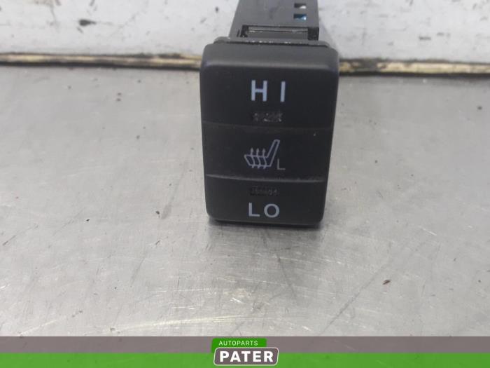 Seat heating switch from a Toyota Auris Touring Sports (E18) 1.8 16V Hybrid 2014