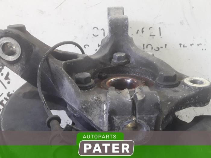 Knuckle, front left from a Opel Astra J Sports Tourer (PD8/PE8/PF8) 1.7 CDTi 16V 2013