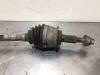 Front drive shaft, left from a Opel Agila (B) 1.0 12V 2011