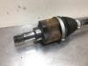Front drive shaft, left from a Volkswagen Up! (121) 1.0 12V 60 2017