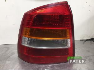 Used Taillight, left Opel Astra G (F08/48) 1.6 Price € 21,00 Margin scheme offered by Autoparts Pater