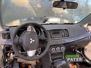 Usados Juego y módulo de airbag Mitsubishi Lancer Sportback (CX) 1.6 MIVEC 16V Precio € 525,00 Norma de margen ofrecido por Autoparts Pater