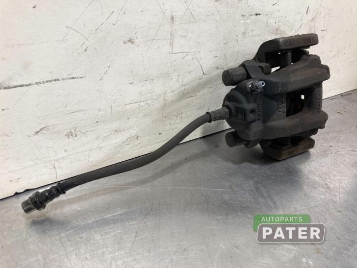 Rear brake calliper, left from a BMW 1 serie (F20) 116d 1.5 12V TwinPower 2018