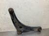 Front wishbone, right from a Mitsubishi Outlander (GF/GG) 2.0 16V PHEV 4x4 2014