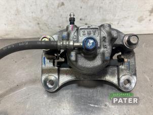 Used Front brake calliper, left Mitsubishi Space Star (A0) 1.2 12V Price € 42,00 Margin scheme offered by Autoparts Pater