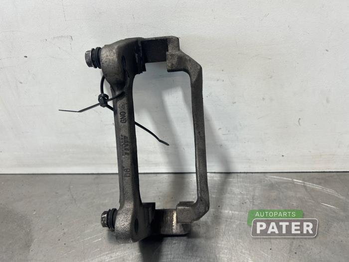 Front brake calliperholder, left from a Volkswagen Caddy IV 2.0 TDI 102 2016