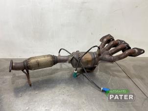 Used Exhaust manifold + catalyst Ford Focus 2 C+C 2.0 16V Price € 210,00 Margin scheme offered by Autoparts Pater