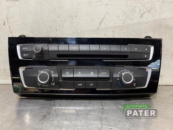 Usagé Commande chauffage BMW 1 serie (F20) 116d 1.5 12V TwinPower Prix € 52,50 Règlement à la marge proposé par Autoparts Pater