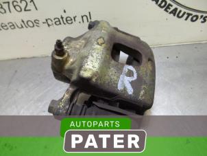 Used Front brake calliper, right Nissan Primera Wagon (W10) 1.6 LX 16V Kat. Price € 42,00 Margin scheme offered by Autoparts Pater