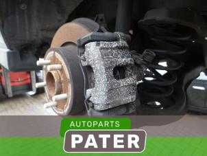 Used Rear brake calliper, left Ford C-Max (DXA) 1.0 Ti-VCT EcoBoost 12V 125 Price € 26,25 Margin scheme offered by Autoparts Pater