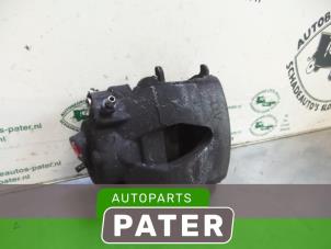 Used Front brake calliper, left Volkswagen Up! (121) 1.0 12V 60 Price € 15,75 Margin scheme offered by Autoparts Pater