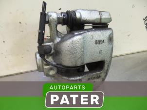Used Front brake calliper, left Mini Mini (R56) 1.6 16V One Price € 31,50 Margin scheme offered by Autoparts Pater