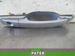 Used Door handle 4-door, front left Ssang Yong Rexton 2.7 Xdi RX/RJ 270 16V Price € 36,75 Margin scheme offered by Autoparts Pater
