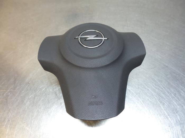 Left airbag (steering wheel) from a Opel Corsa D 1.4 16V Twinport 2009