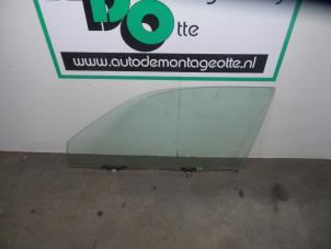 Used Door window 2-door, left Toyota Corolla (E11) 1.3 16V Price € 35,00 Margin scheme offered by Autodemontagebedrijf Otte