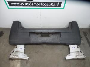 Usagé Pare-chocs arrière Daihatsu Cuore (L251/271/276) 1.0 12V DVVT Prix € 50,00 Règlement à la marge proposé par Autodemontagebedrijf Otte
