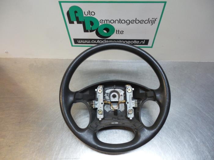 Steering wheel from a Hyundai Coupe 2.0i 16V 2000