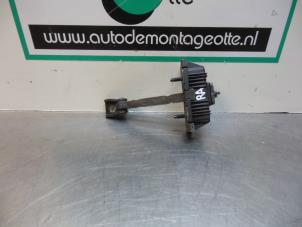 Used Rear door stop 4-door, right Toyota Avensis Wagon (T25/B1E) 1.8 16V VVT-i Price € 15,00 Margin scheme offered by Autodemontagebedrijf Otte