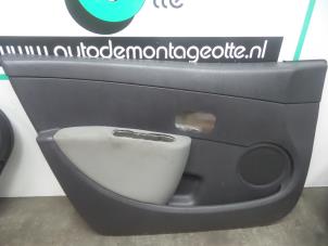 Used Door trim 4-door, front left Renault Clio III (BR/CR) 1.2 16V 75 Price € 40,00 Margin scheme offered by Autodemontagebedrijf Otte