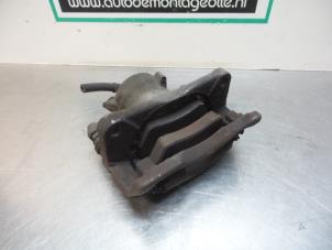 Used Front brake calliper, left Suzuki Swift (ZA/ZC/ZD1/2/3/9) 1.3 VVT 16V Price € 15,00 Margin scheme offered by Autodemontagebedrijf Otte