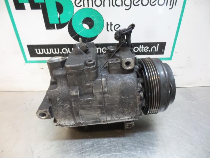 Air conditioning pump from a Opel Zafira (F75) 1.8 16V 2000
