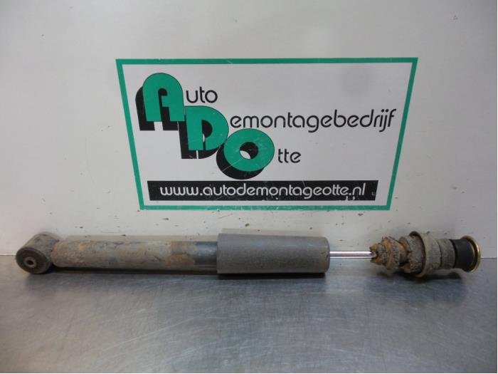 Rear shock absorber, left from a Seat Arosa (6H1) 1.4i 2001