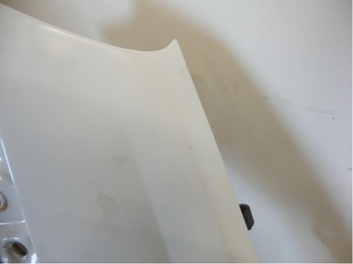 Front wing, left from a Opel Combo (Corsa C) 1.7 DI 16V 2004