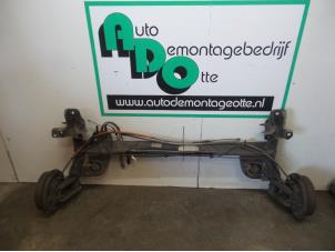 Używane Os tylna napedu na przednie kola Renault Twingo II (CN) 1.2 Cena € 100,00 Procedura marży oferowane przez Autodemontagebedrijf Otte