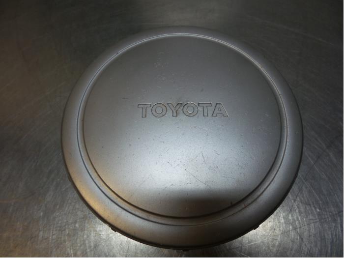 Wheel cover set from a Toyota Starlet (EP9) 1.3,XLi,GLi 16V 1997
