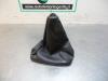 Gear stick cover from a Suzuki New Ignis (MH), 2003 / 2007 1.5 16V, Hatchback, 4-dr, Petrol, 1.490cc, 73kW (99pk), FWD, M15AVVT, 2003-09 / 2007-12, MHX81 2005