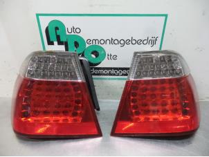 Used Set of taillights, left + right BMW 3 serie (E46/4) 316i 16V Price € 50,00 Margin scheme offered by Autodemontagebedrijf Otte