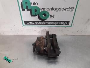Used Front brake calliper, left BMW Mini One/Cooper (R50) 1.6 16V Cooper Price € 20,00 Margin scheme offered by Autodemontagebedrijf Otte