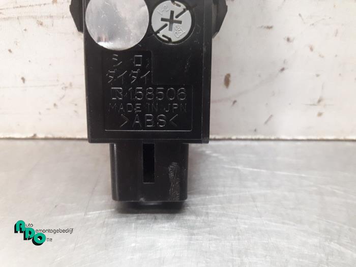 Rear window heating switch from a Toyota Starlet (EP8/NP8) 1.3 Friend,XLi 12V 1994