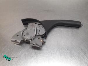 Used Parking brake lever Toyota Corolla (E12) 1.4 16V VVT-i Price € 30,00 Margin scheme offered by Autodemontagebedrijf Otte