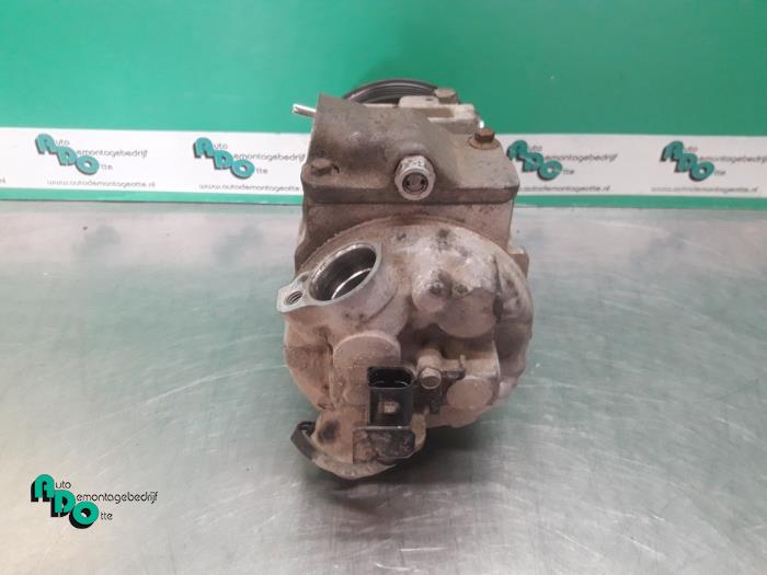 Air conditioning pump from a Seat Ibiza III (6L1) 1.4 16V 85 2008