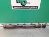 Rear shock absorber, left from a Renault Clio III (BR/CR) 1.4 16V 2006