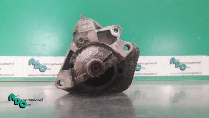 Starter from a Renault Twingo II (CN) 1.5 dCi 90 FAP 2011