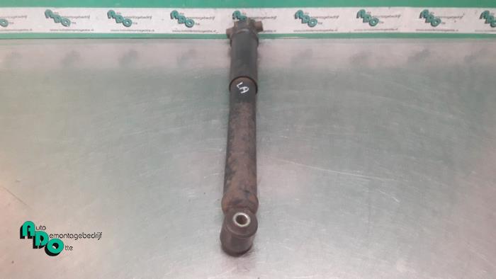 Rear shock absorber, left from a Ford Focus 1 Wagon 1.6 16V 2004