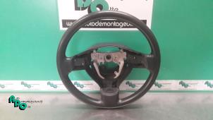 Used Steering wheel Daihatsu Cuore (L251/271/276) 1.0 12V DVVT Price € 25,00 Margin scheme offered by Autodemontagebedrijf Otte