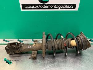 Used Front shock absorber rod, left Renault Clio III (BR/CR) 1.5 dCi FAP Price € 30,00 Margin scheme offered by Autodemontagebedrijf Otte