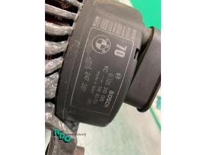 Dynamo van een BMW 3 serie (E36/2) 318iS 1.8 16V 1995