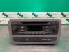 Radio CD player from a Seat Ibiza IV (6J5) 1.2 TDI Ecomotive 2013