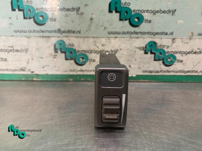 Panel lighting control switch
